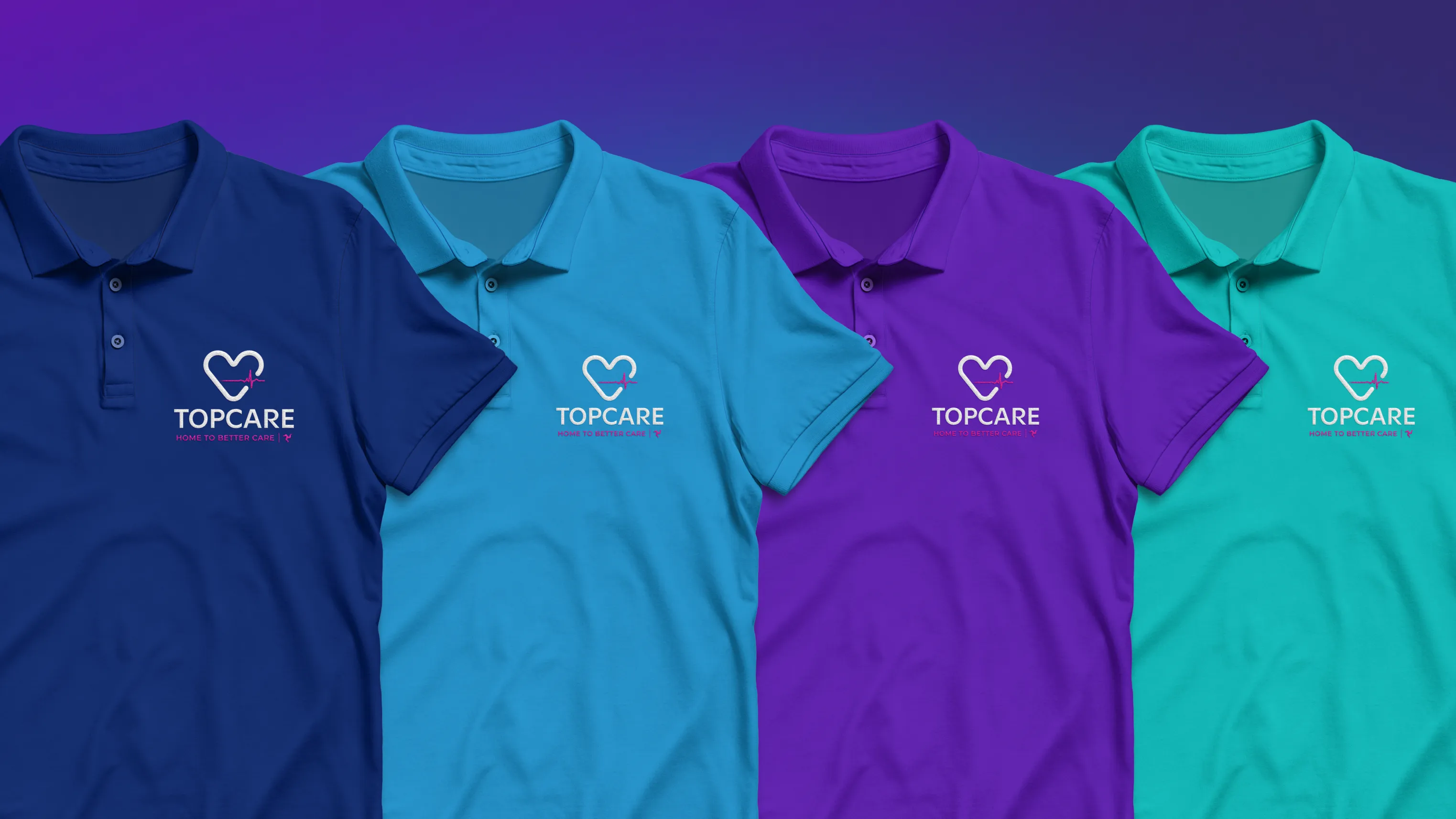 Two purple polo shirts with the TopCare homecare agency logo embroidered on the chest